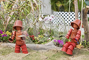 Toy dollÃ¢â¬â¹ in backyard garden photo